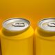 Unbranded yellow beverage cans with silver pull tabs