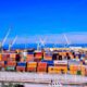 Shipping containers and cranes at a commercial port