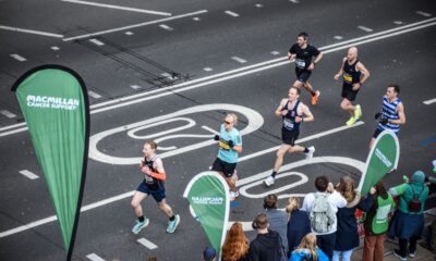Overhead view of runners and spectators on a London street