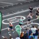 Overhead view of runners and spectators on a London street