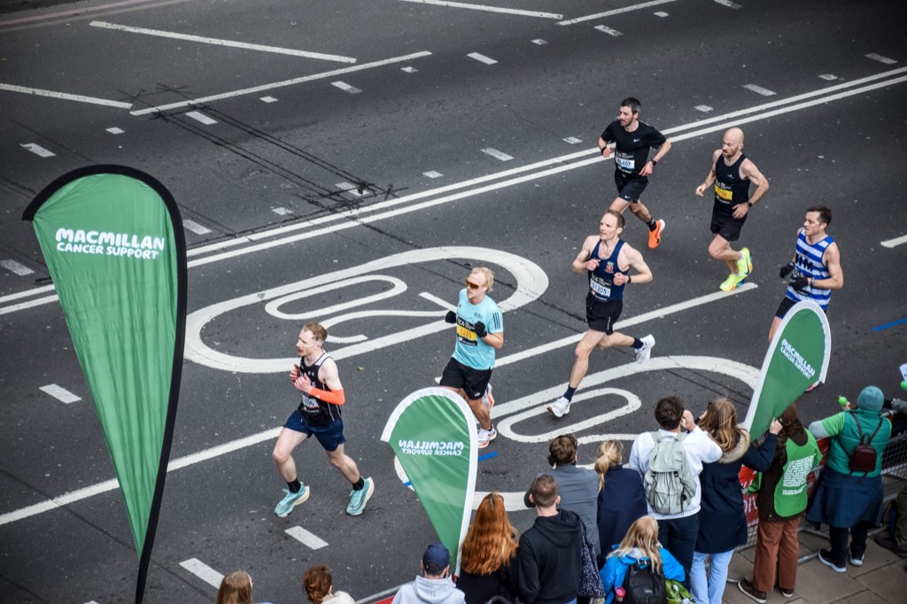 Overhead view of runners and spectators on a London street