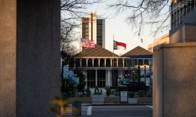 North Carolina Legislative Building in Raleigh with American and state flags