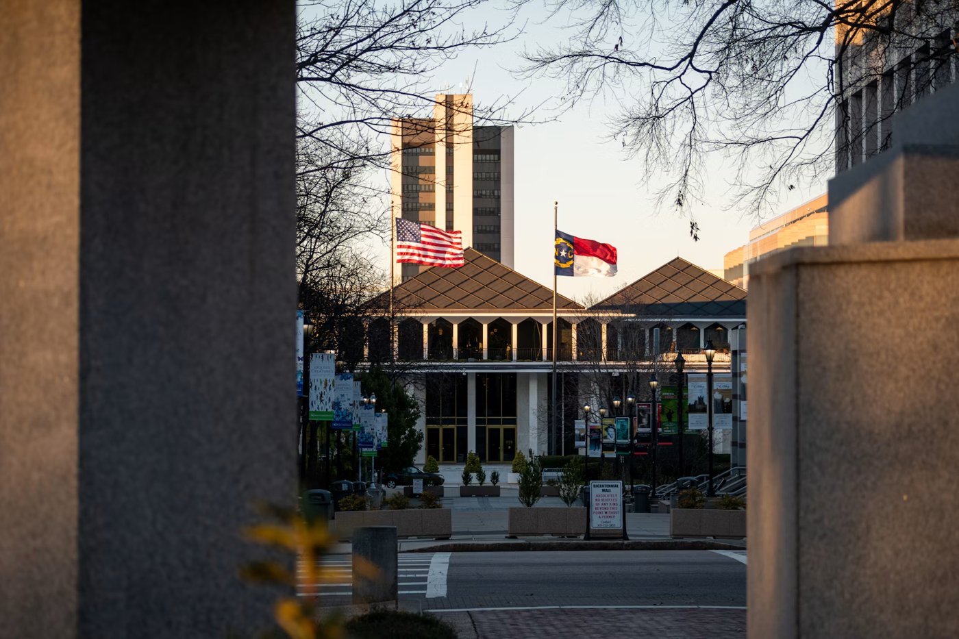 North Carolina Legislative Building in Raleigh with American and state flags