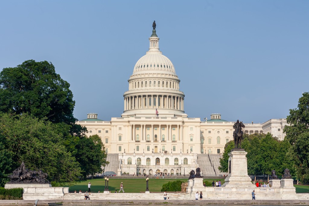 United States Capitol building beneath a blue sky
