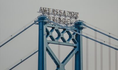 Blue steel structure of the Ambassador Bridge viewed from below