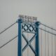 Blue steel structure of the Ambassador Bridge viewed from below
